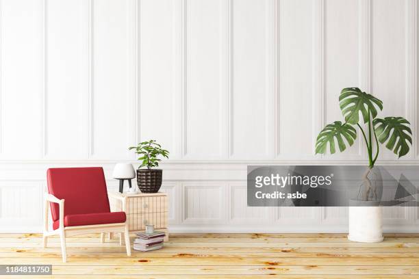 intérieur blanc avec fauteuil - style classique photos et images de collection