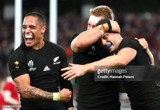 Ben Smith of New Zealand celebrates with Sam Cane and Aaron Smith as he scores his team's fourth try during the Rugby World Cup 2019 Bronze Final...