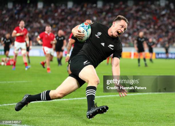 Ben Smith of New Zealand goes over to score his team's fourth try during the Rugby World Cup 2019 Bronze Final match between New Zealand and Wales at...