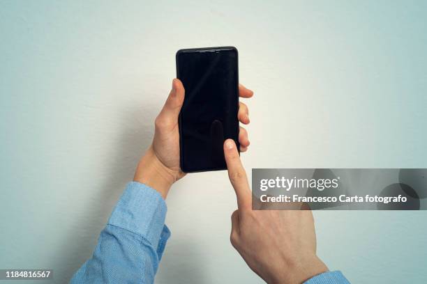 man using smart phone - finger dialing touch tone telephone stock pictures, royalty-free photos & images