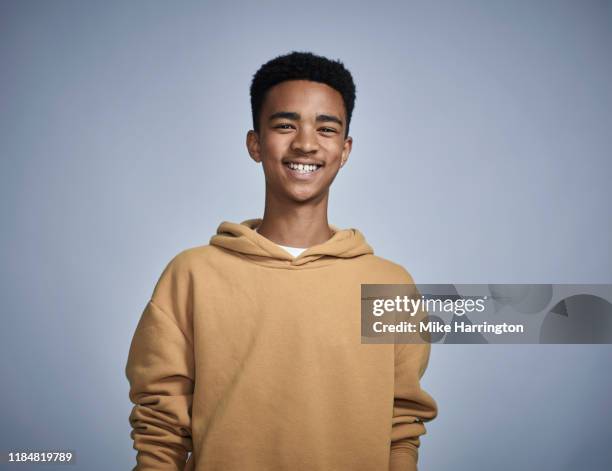 portrait of young african ethnicity male - boy portrait studio stock-fotos und bilder