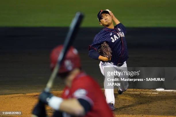 Pitcher Shota Imanaga of Japan throws in the bottom of 1st inning during the game two between Samurai Japan and Canada at the Okinawa Cellular...