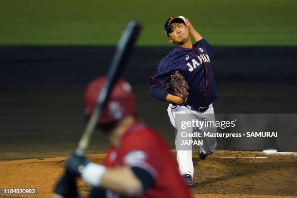 Pitcher Shota Imanaga of Japan throws in the bottom of 1st inning during the game two between Samurai Japan and Canada at the Okinawa Cellular...