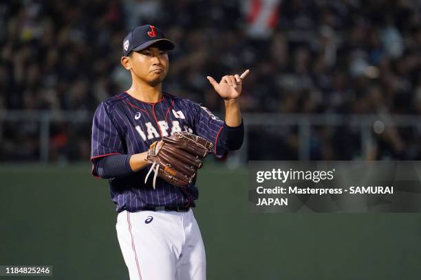 Pitcher Shota Imanaga of Japan gestures in the bottom of 3rd inning during the game two between Samurai Japan and Canada at the Okinawa Cellular...