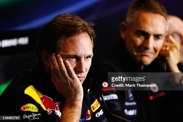 Red Bull Racing Team Principal Christian Horner and McLaren Team Principal Martin Whitmarsh attend the F.I.A. Official press conference following...