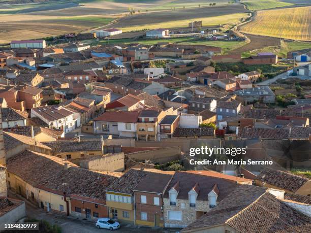 aerial view of houses, streets and fields in the spanish municipality of torrelobatón. - flugzeug in der luft stock-fotos und bilder