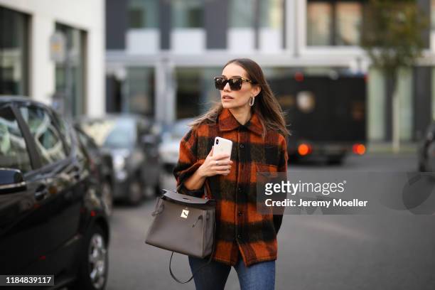 Anna Schürrle wearing H&M jeans, Hermès bag, Anine Bing jacket, News  Photo - Getty Images