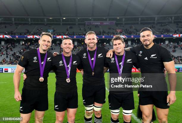 Ben Smith, Ryan Crotty, Kieran Read, Matt Todd and Sonny Bill Williams of New Zealand pose for a photo on the pitch following the Rugby World Cup...