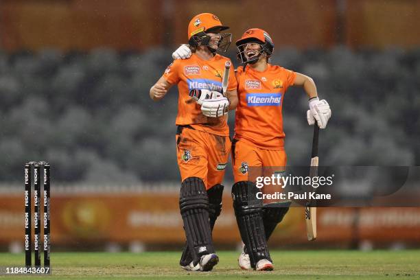 Meg Lanning and Nicole Bolton of the Scorchers celebrate after winning the Women's Big Bash League match between the Perth Scorchers and the...