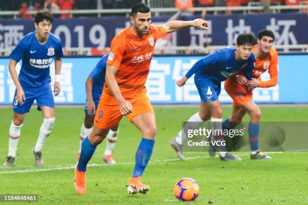 Graziano Pelle of Shandong Luneng takes a penalty kick during the 2019 Chinese Football Association Cup final match between Shandong Luneng and...