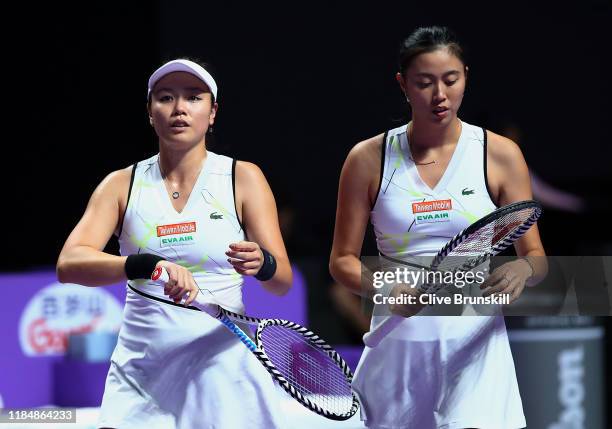 Hao-Ching Chan and Latisha Chan of Chinese Taipei prepare to play against Anna-Lena Groenefeld of Germany and Demi Schuurs of the Netherlands during...