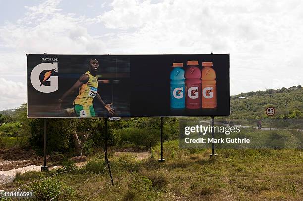 Billboard posters showing world record holder sprinter Usain Bolt illustrate what an icon he represenets for the people of Jamaica photographed on...