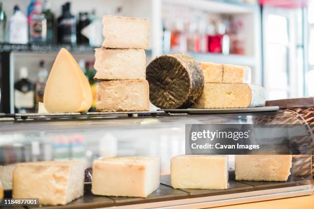 variety of cheeses im a restaurant - limburger cheese photos et images de collection
