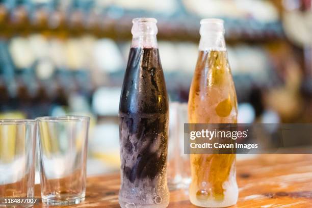 wines in a traditional restaurant of tenerife - cola bottle photos et images de collection