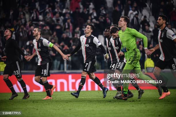 Juventus' Italian forward Federico Bernardeschi, Juventus' Italian defender Leonardo Bonucci, Juventus' Portuguese forward Cristiano Ronaldo,...