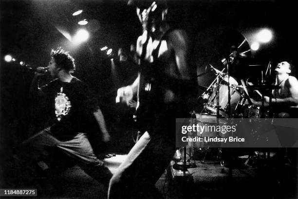 Tom Morello, Zack de la Rocha, Brad Wilk, and Tim Commerford perform at Nomads on July 3, 1992 in Los Angeles.