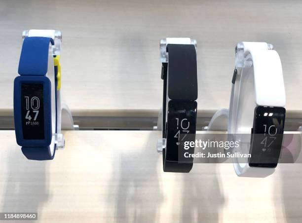 Fitbit activity trackers are displayed at a Best Buy store on November 01, 2019 in San Rafael, California. Google parent company Alphabet announced...