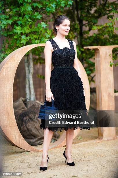 Laetitia Casta en robe bustier sirène blanche à plumes Dior couture Laetitia Casta en robe bustier sirène blanche à plumes Dior couture