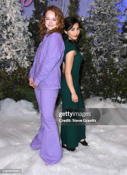 Liv Hewson and Anna Akana arrives at the Photocall For Netflix's "Let It Snow" at the Beverly Wilshire Four Seasons Hotel on November 01, 2019 in...