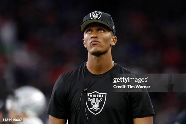 DeShone Kizer of the Oakland Raiders reacts on the sideline in the fourth quarter against the Houston Texans at NRG Stadium on October 27, 2019 in...