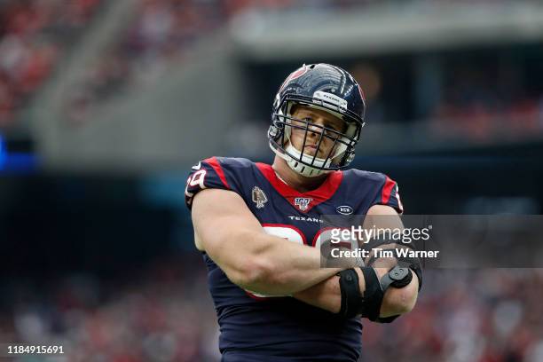 Watt of the Houston Texans celebrates after blocking a pass in the first half against the Oakland Raiders at NRG Stadium on October 27, 2019 in...