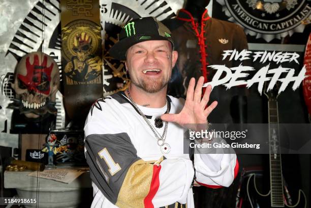 Singer Ivan Moody of Five Finger Death Punch attends a memorabilia case dedication ahead of the band's two-night Sin City Monster Bash and the start...