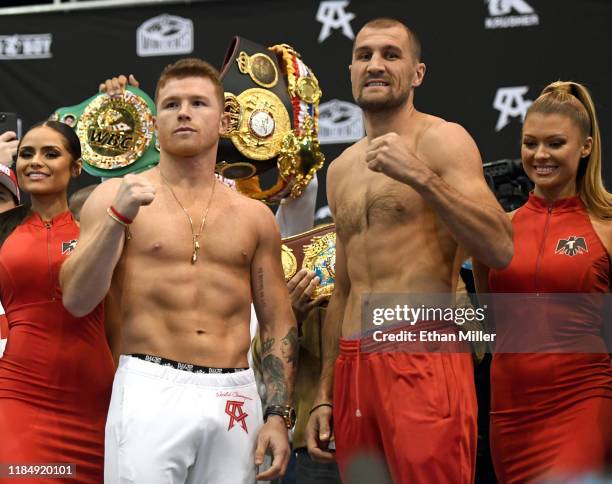 Boxer Canelo Alvarez and WBO light heavyweight champion Sergey Kovalev pose during their official weigh-in at MGM Grand Garden Arena on November 1,...