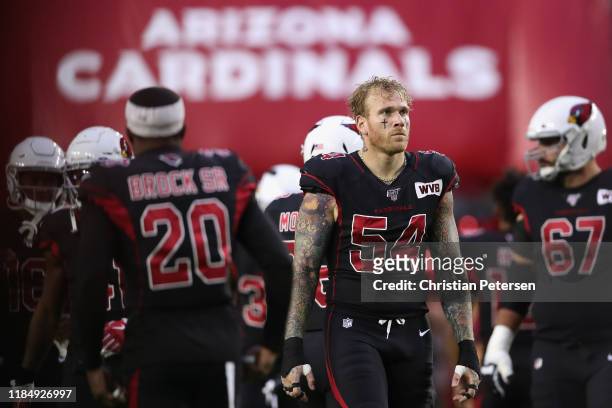 Linebacker Cassius Marsh of the Arizona Cardinals takes the field before the NFL game against the San Francisco 49ers at State Farm Stadium on...