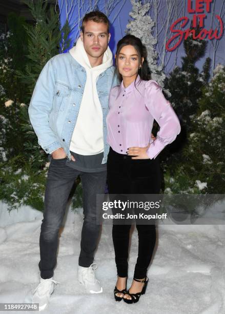 Matthew Noszka and Odeya Rush attend the photocall for Netflix's "Let It Snow" at the Beverly Wilshire Four Seasons Hotel on November 01, 2019 in...