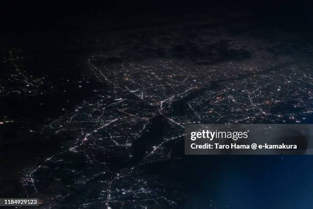 takatsuki and hirakata cities in osaka prefecture of japan aerial view from airplane - hirakata city stock pictures, royalty-free photos & images