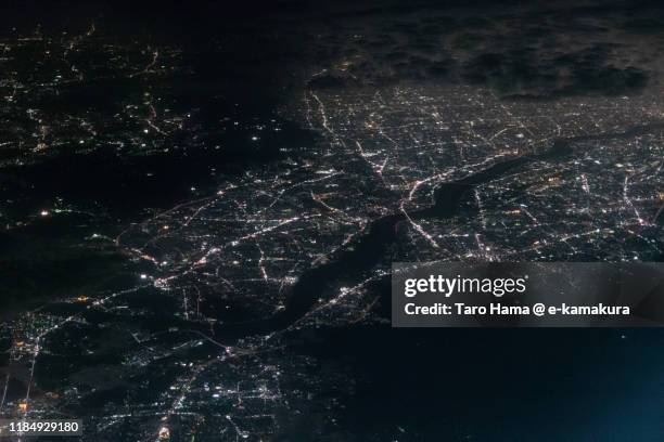 takatsuki and hirakata cities in osaka prefecture of japan aerial view from airplane - hirakata city stock pictures, royalty-free photos & images