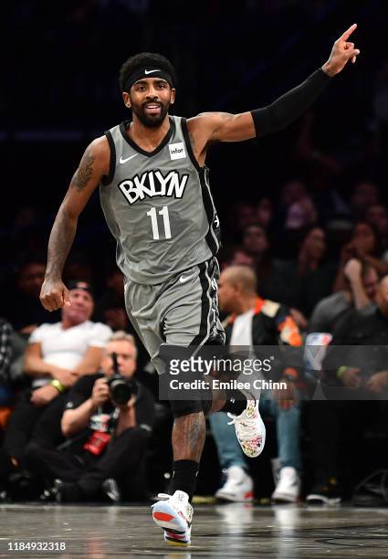 Kyrie Irving of the Brooklyn Nets reacts during the first half of their game against the Houston Rockets at Barclays Center on November 01, 2019 in...