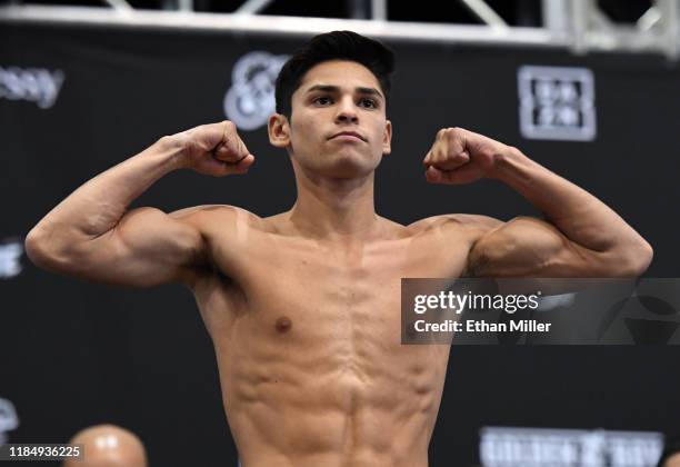 Boxer Ryan Garcia poses on the scale during his official weigh-in at MGM Grand Garden Arena on November 1, 2019 in Las Vegas, Nevada. Garcia will...