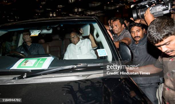 Chief Sharad Pawar leaves Trident Hotel after a meeting with Shiv Sena Chief Uddhav Thackeray, on November 26, 2019 in Mumbai, India. Uddhav was...