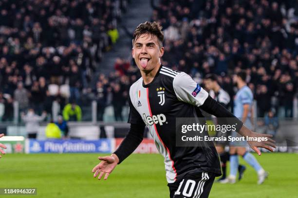 Paulo Dybala of Juventus celebrates his goal during the UEFA Champions League group D match between Juventus and Atletico Madrid at Juventus Arena on...