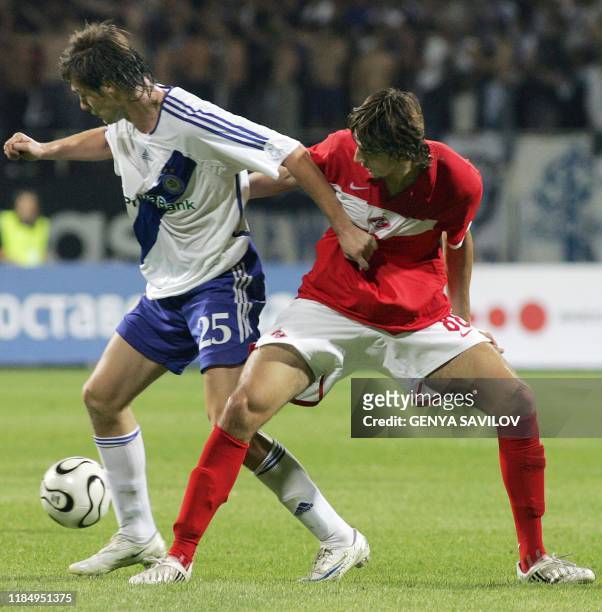 Artem Milevsky of Dynamo Kiev fights for the ball against Egor Filipenko of Spartak Moscow during their Champions league qualifying match in Kiev on...