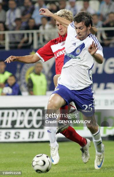 Artem Milevsky of Dynamo Kiev vies for the ball with Radoslav Kovach of Spartak Moscow during their Champions league qualifying match in Kiev on...