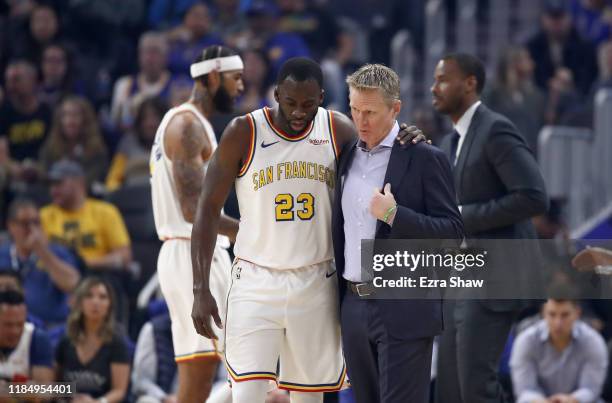 Draymond Green of the Golden State Warriors talks to head coach Steve Kerr during their game against the San Antonio Spurs at Chase Center on...