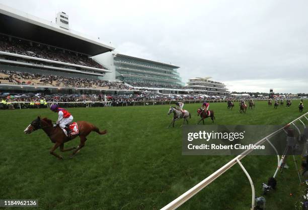 Damien Oliver rides Warning to win race seven the AAMI Victoria Derby during 2019 Derby Day at Flemington Racecourse on November 02, 2019 in...