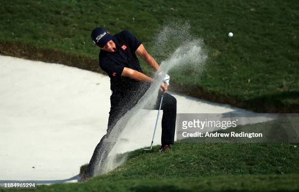 Adam Scott of Australia plays his second shot on the ninth hole during Day Three of the WGC HSBC Champions at Sheshan International Golf Club on...