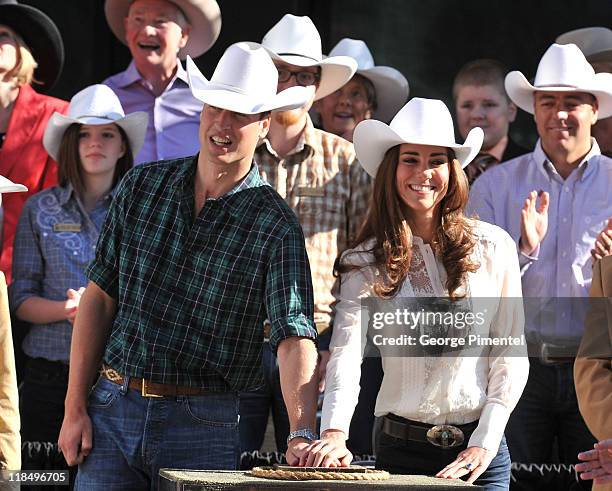 Prince William, Duke of Cambridge and Catherine, Duchess of Cambridge attend the Calgary Stampede Parade on day 9 of the Royal couple's tour of North...