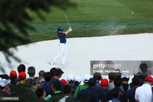 Matthew Fitzpatrick of England plays out of a bunker on the 2nd hole during Day Three of the WGC HSBC Champions at Sheshan International Golf Club on...