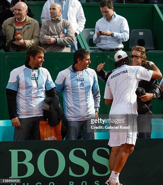 Eduardo Schwank ank and David Nalbandian of Argentine celebrate after the match between Argentina and Kazakhstan for second day in the quarters final...