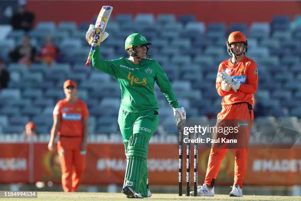 Lizelle Lee of the Stars celebrates her century during the Women's Big Bash League match between the Perth Scorchers and Melbourne Stars at the WACA...