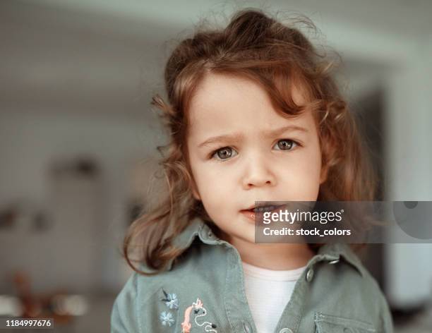 baby girl with an attitude! - asking stock pictures, royalty-free photos & images