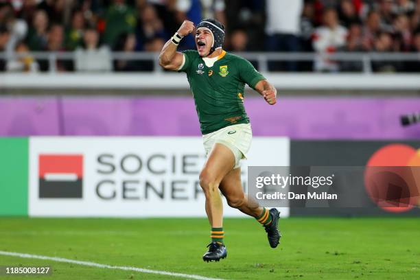 Cheslin Kolbe of South Africa celebrates after scoring his team's second try during the Rugby World Cup 2019 Final between England and South Africa...