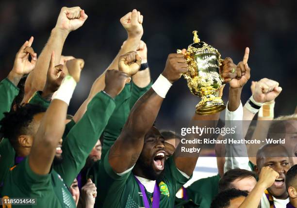 Siya Kolisi of South Africa lifts the Web Ellis cup following his team's victory against England in the Rugby World Cup 2019 Final between England...