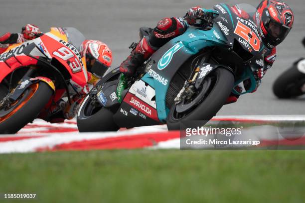 Fabio Quartararo of France and Petronas Yamaha SRT leads Marc Marquez of Spain and Repsol Honda Team during the MotoGP of Malaysia - Qualifying at...