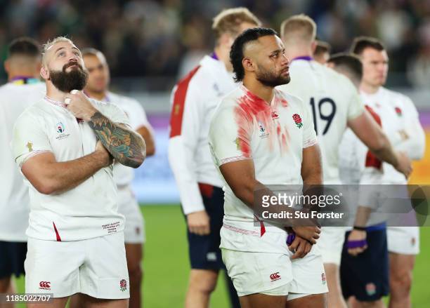 Joe Marler and Billy Vunipola of England look on dejected after defeat in the Rugby World Cup 2019 Final between England and South Africa at...