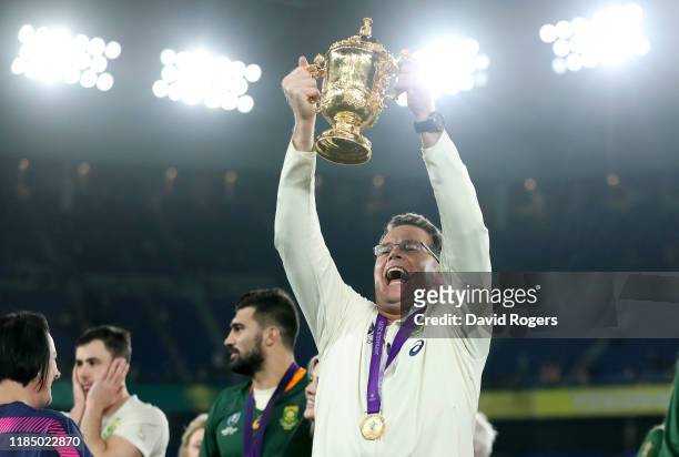 Rassie Erasmus, Head Coach of South Africa celebrates with the Web Ellis Cup following their victory against England in the Rugby World Cup 2019...